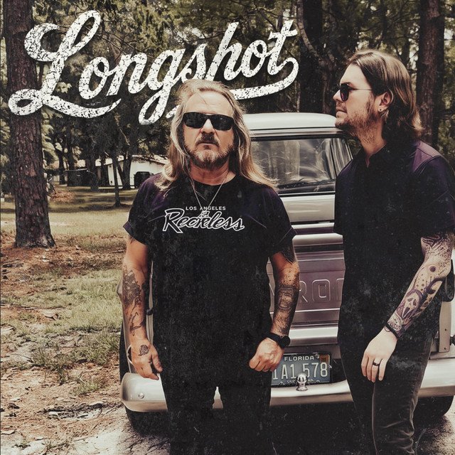 saliva-x-johnny-van-zant-x-lynyrd-skynyrd-x-judge-jury-longshot-rock-album-cover-nagamag-music-magazine Pulse Review: “Longshot” by Saliva x Johnny Van Zant x Lynyrd Skynyrd x Judge & Jury | What Rock meant to be